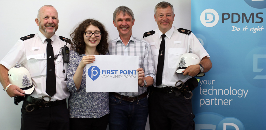 Alexandra and Chris from PDMS stood with two members of the police