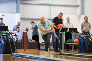 Henry Lord playing ten pin bowling