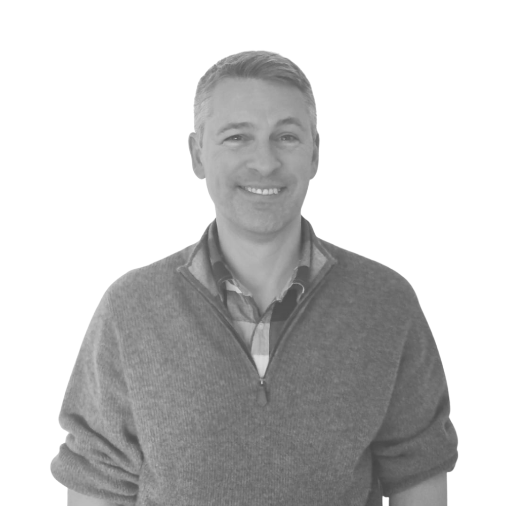 Black and white headshot of Andy McBrearty