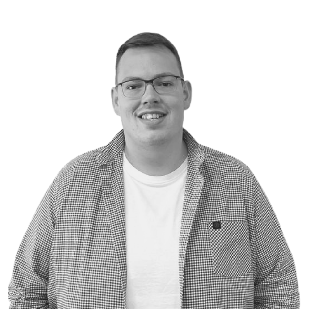 Black and white headshot of Nick Collins
