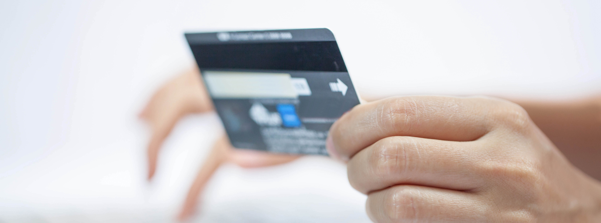 A picture of somebody typing in card details 