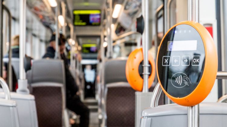 A photo of a contactless ticket point on a busy bus