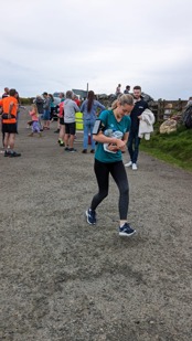 Georgia Vernon running at the start of her leg of Race the Sun