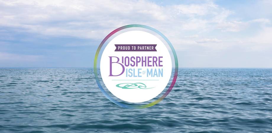 Biosphere Isle of Man logo over background of the sea
