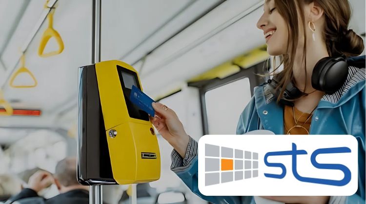 An image of a woman tapping a contactless debit card on a terminal on a bus with the STS logo overlaid on top