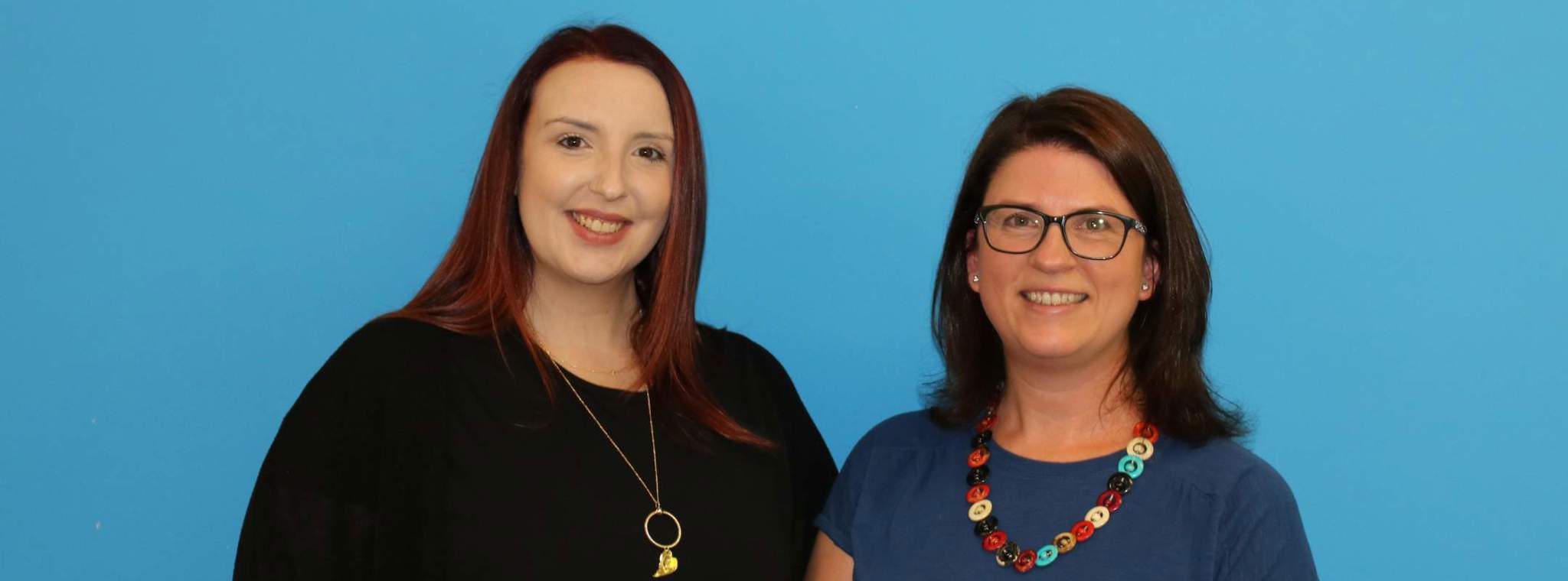 A photo of Freya and Jayne stood side-by-side