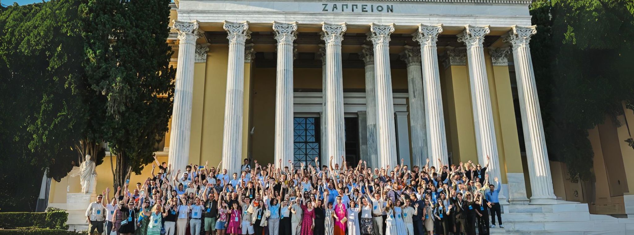 The Gen-E 2025 attendees in a group photo in front of the Zappeion Megaron building
