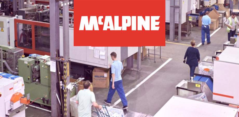 McAlpine plumbing logo and photo of factory shop floor