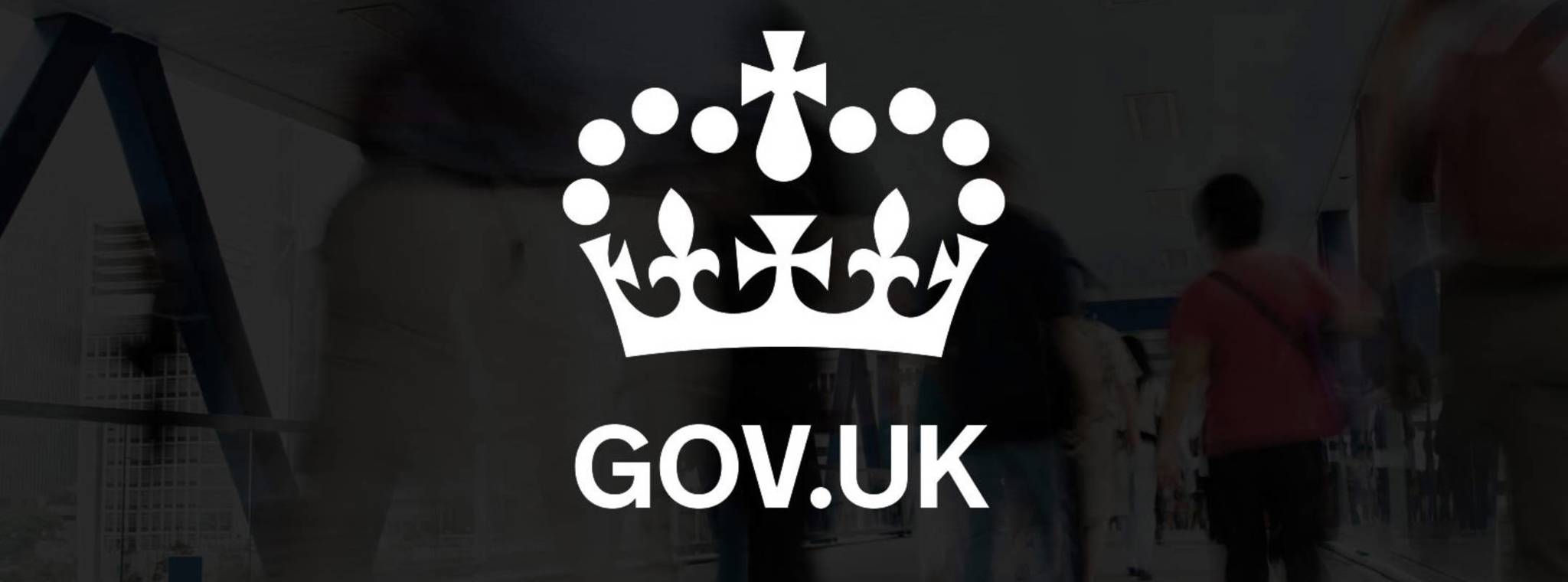 Gov UK crest with background of people walking