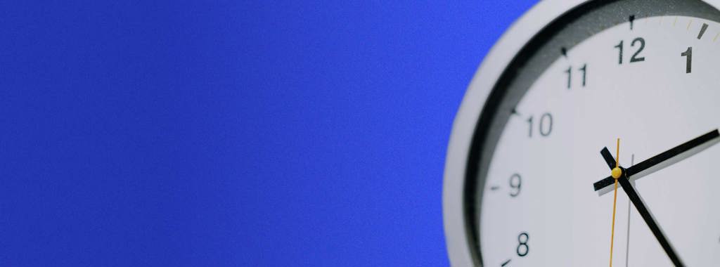 Image of clock on a blue background