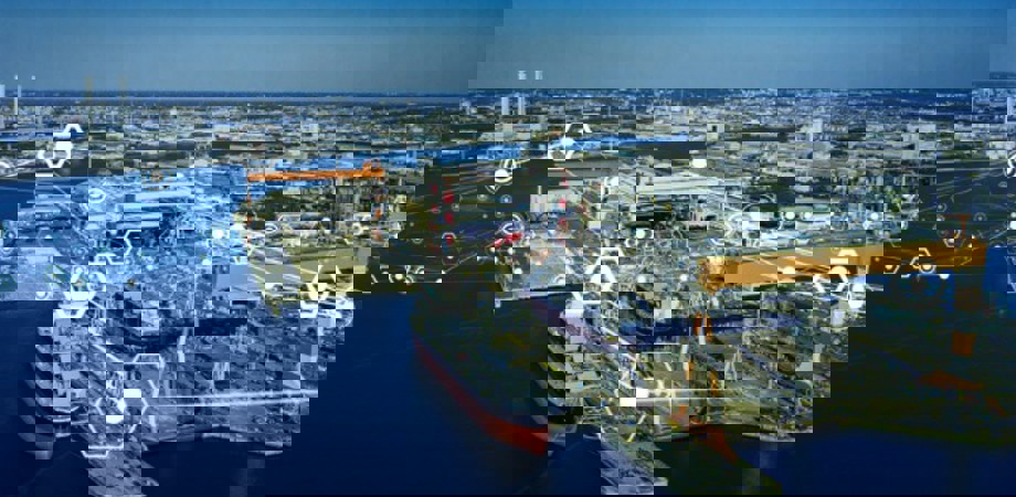 Modern shipyard aerial view with an overlay of interconnected digital icons
