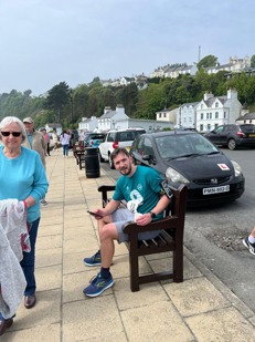 George Stephenson sat on bench after finishing his leg of Race the Sun