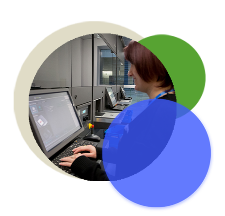 An image of a lady using a computer system