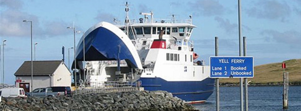 An image of Shetland pier with ferry docked