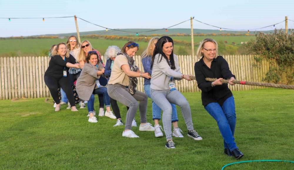 Picture of PDMS team members playing a tug of war