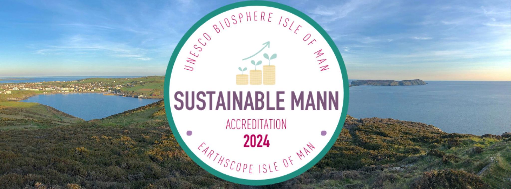 A panoramic photo of Port Erin Bay with the UNESCO Biosphere Sustainable Mann accreditation logo
