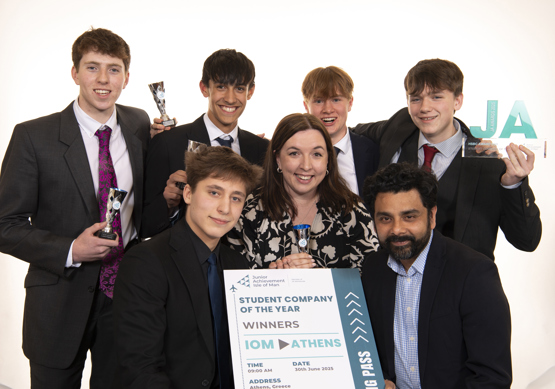 Hannah with the ArthEsy team and their trophies after winning Isle of Man Company of the Year